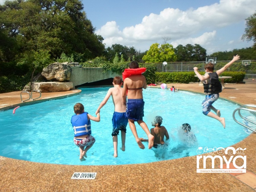 Young boys living at the long-term residential campus, RMYA Meadowland, in Boerne enjoy the onsite swimming pool. Children at RMYA have suffered, but we try to find joy whenever we can. Impact