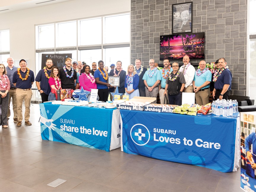Wish Kid Anthony, in the center of the photo, went to Hawaii for his one true wish! Impact