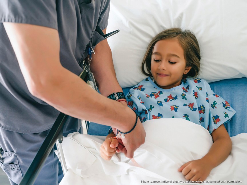 Patient working with their Child Life Specialist. Impact