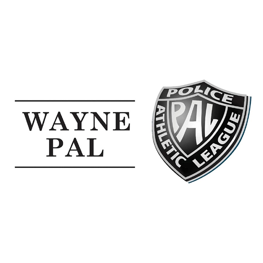 Children enjoying Breakfast with Santa and receiving a gift from Santa.