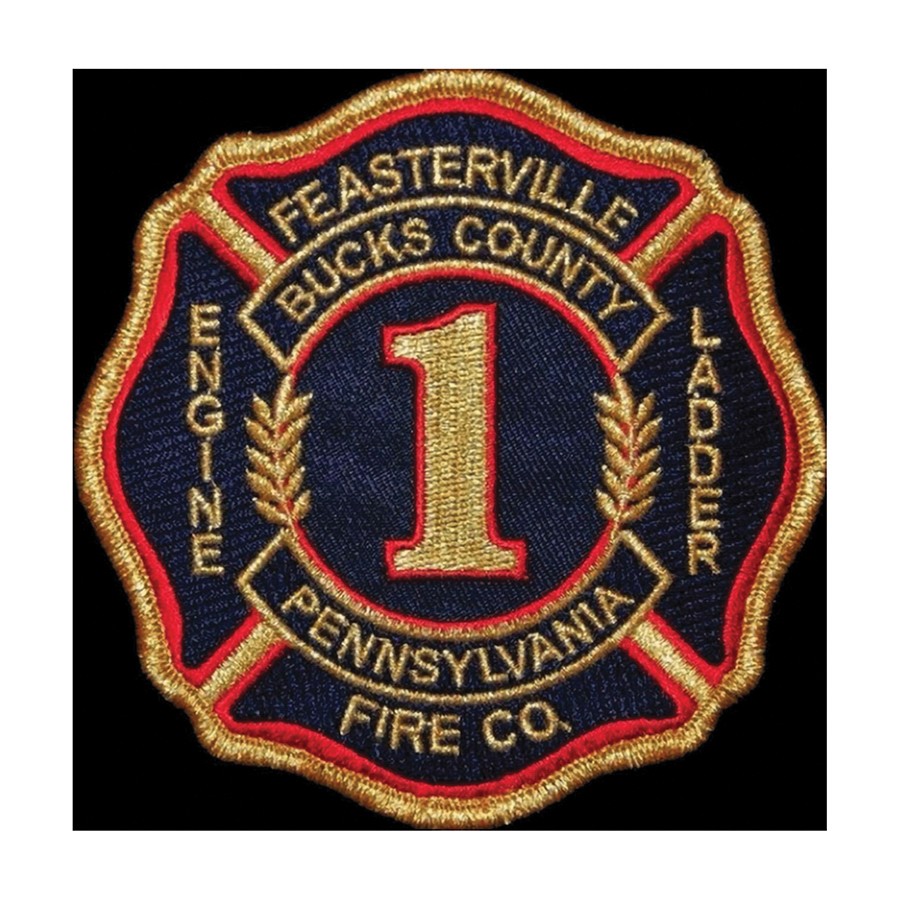 Firefighters Left to Right (Lieutenant Andre Aloian, Firefighter Dave Williams, Deputy Chief Mike Gillie, Head Trustee Thomas Walter, Firefighter Joe Gillie) in front of Feasterville Fire Company Ladder 1 with Subaru Representatives.