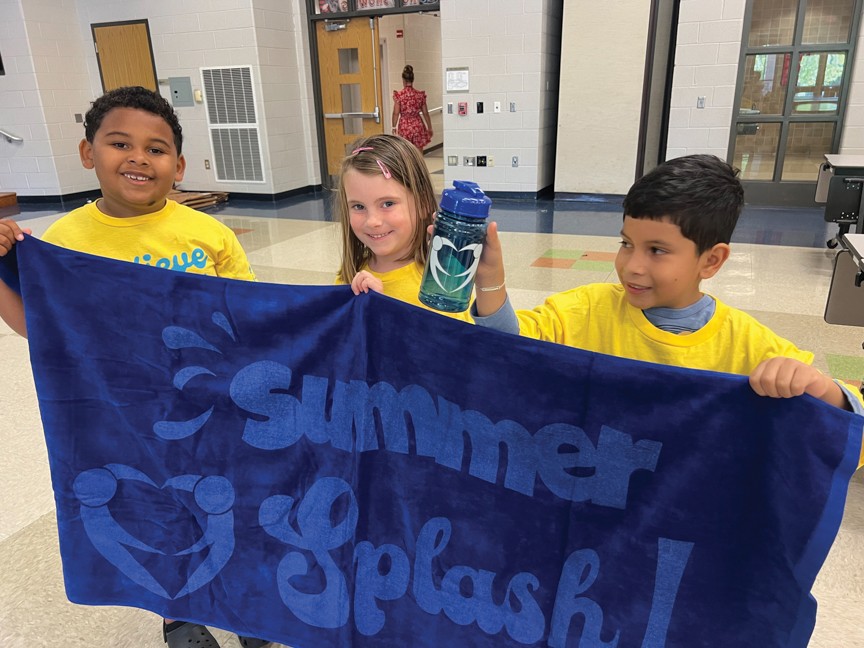 This year, we provided 1800 camp bags containing a new bathing suit, flipflops, towel, & water bottle to kids at 25 different camp locations in our community. Additionally, a library of books was provided so each child could take home a new book! Impact