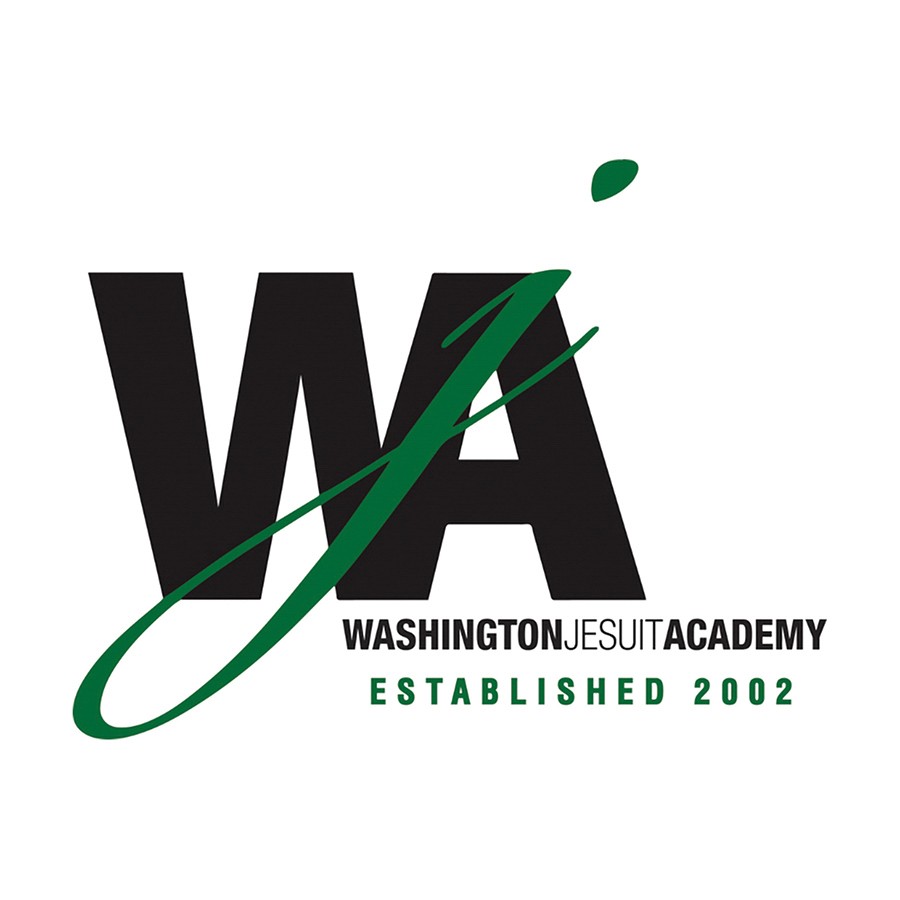 Stohlman Subaru presents Washington Jesuit Academy students with a generous donation from the Subaru Share the Love Event.