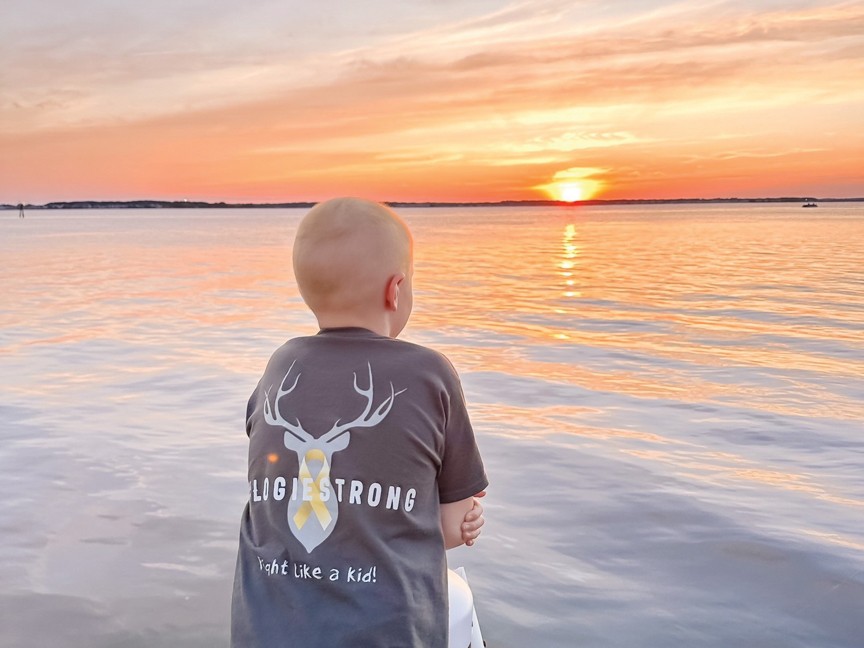 Critically ill child enjoying an escape from the stressful routine of medical treatments at a Believe In Tomorrow respite facility in Ocean City, MD. Impact