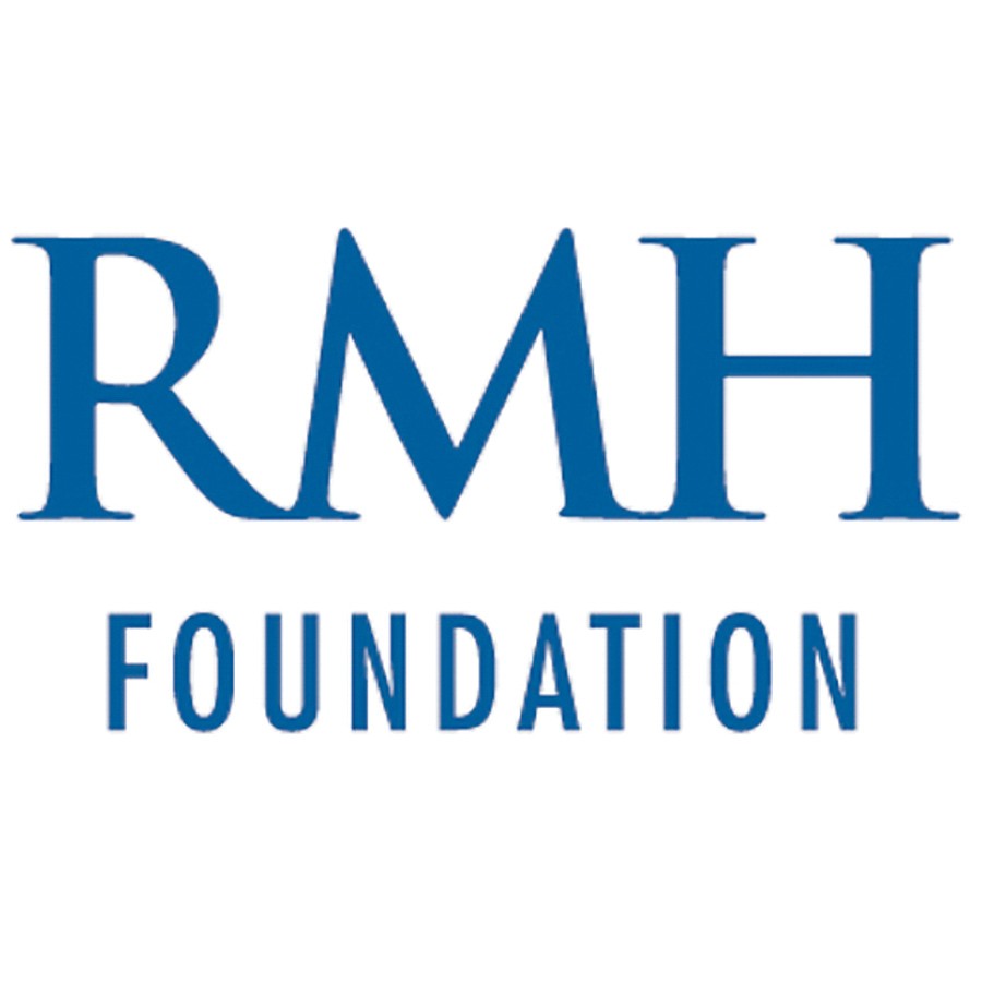 Bob Wade Subaru Sales Managers Steve Gilette and Kevin Knott present a check to Benjamin Craig of the RMH Foundation as part of the 2023 Subaru Share the Love Event.