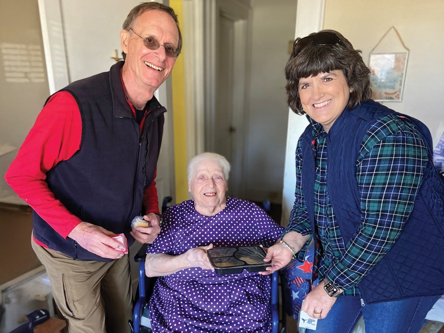 Volunteer Steve Hefner and DSS Board Member Sherry Butler deliver a meal to client Wanda Ammerman. Impact