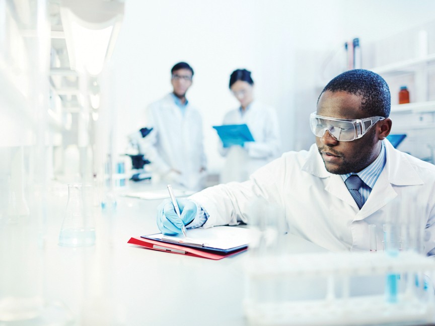 Cancer researcher working in the lab. Impact