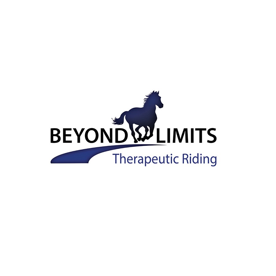 With a blue ribbon held high and a beaming smile, a young rider celebrates triumph at the Beyond Limits Fall Horse Show - a moment made possible through Subaru's Share the Love support, where therapy meets confidence in the saddle.