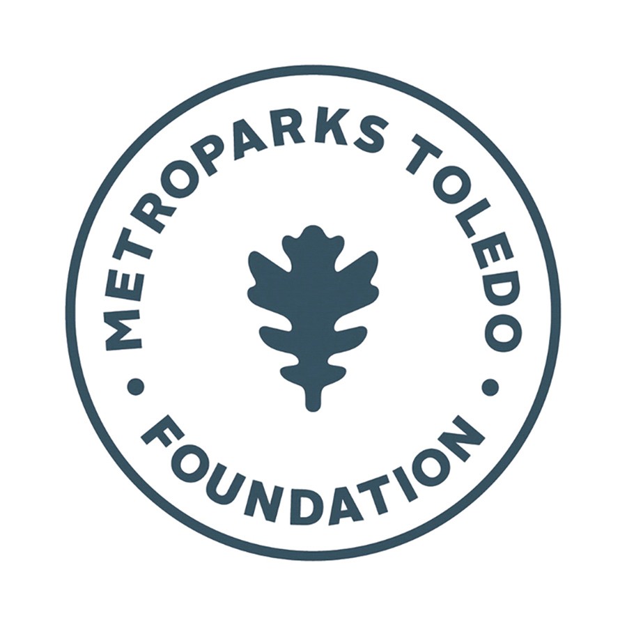 Metroparks Toledo volunteers sharing information and materials about Metroparks Toledo and Metroparks Toledo Foundation with customers at Yark Subaru Open House event.