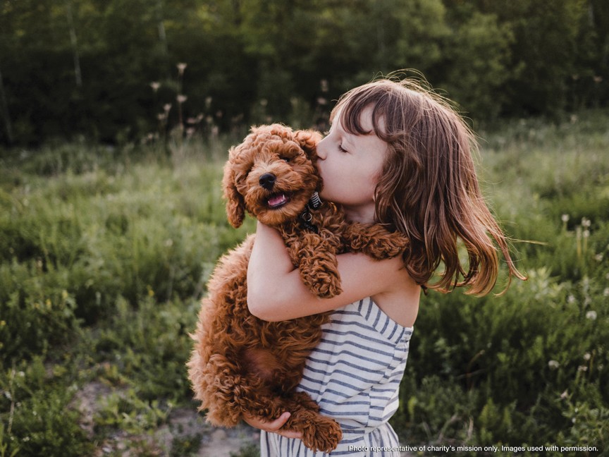 This is Abby. She works in HR at Maple Hill. She loves animals, grew up volunteering at SPCA, and is now our secretary. Impact