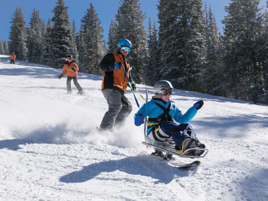 ASPNM athlete Cassidy takes to the slopes of Ski Santa Fe in a bi-ski with Adaptive Sports Program New Mexico instructor Jason Cline. Cassidy has skied with ASPNM for over 20 years. Impact