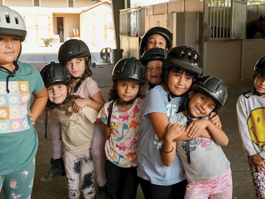 With riding helmets on, TTR girls are full of smiles and anticipation as they get ready to ride and learn about horses at TTR's 1.4-acre urban farm, complete with a riding arena and 15 horse stalls along the L.A. River. Impact