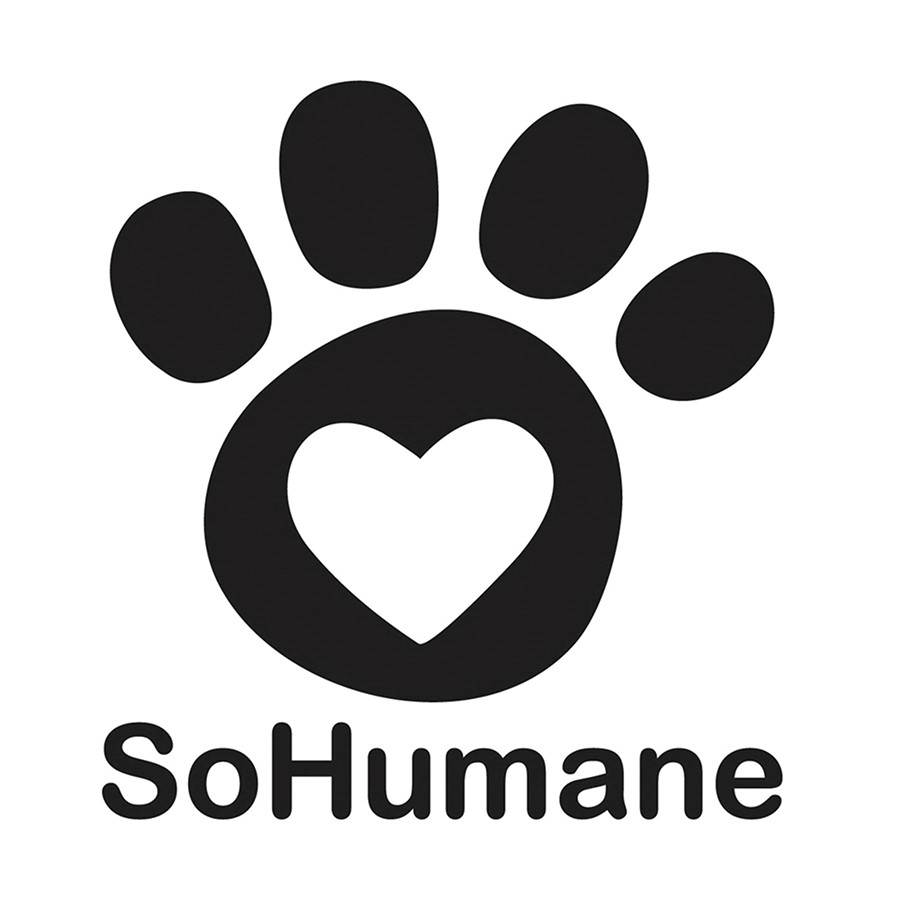 A joyful moment at the 2024 Share the Love Event: a smiling woman and young girl proudly hold their newly adopted dog, ready to start a new chapter together as a family.