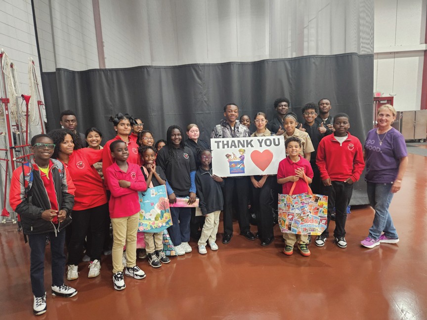 One of the groups of children from the orphanage that enjoyed a day of fun and prizes. Impact