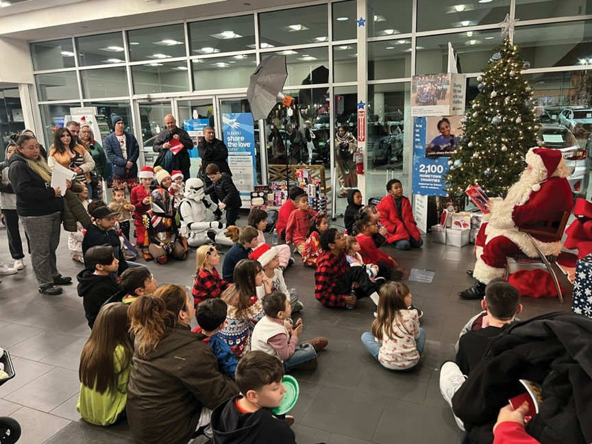 The Holly Jolly Holiday party is an annual tradition for wish kids and their families. It is hosted in the showroom and Santa makes an appearance to surprise all of the children with gifts. Impact