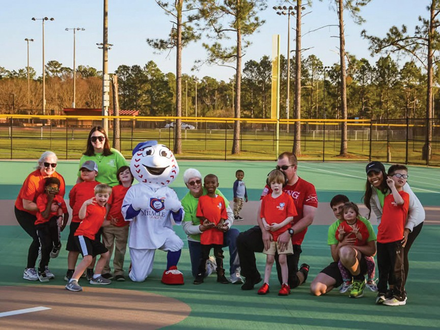 Our athletes love the Miracle League! Therefore, we make sure they feel extra special by taking a group and individual picture. Then at the end of the season, we have a party where we give them a picture & a gold medal Impact