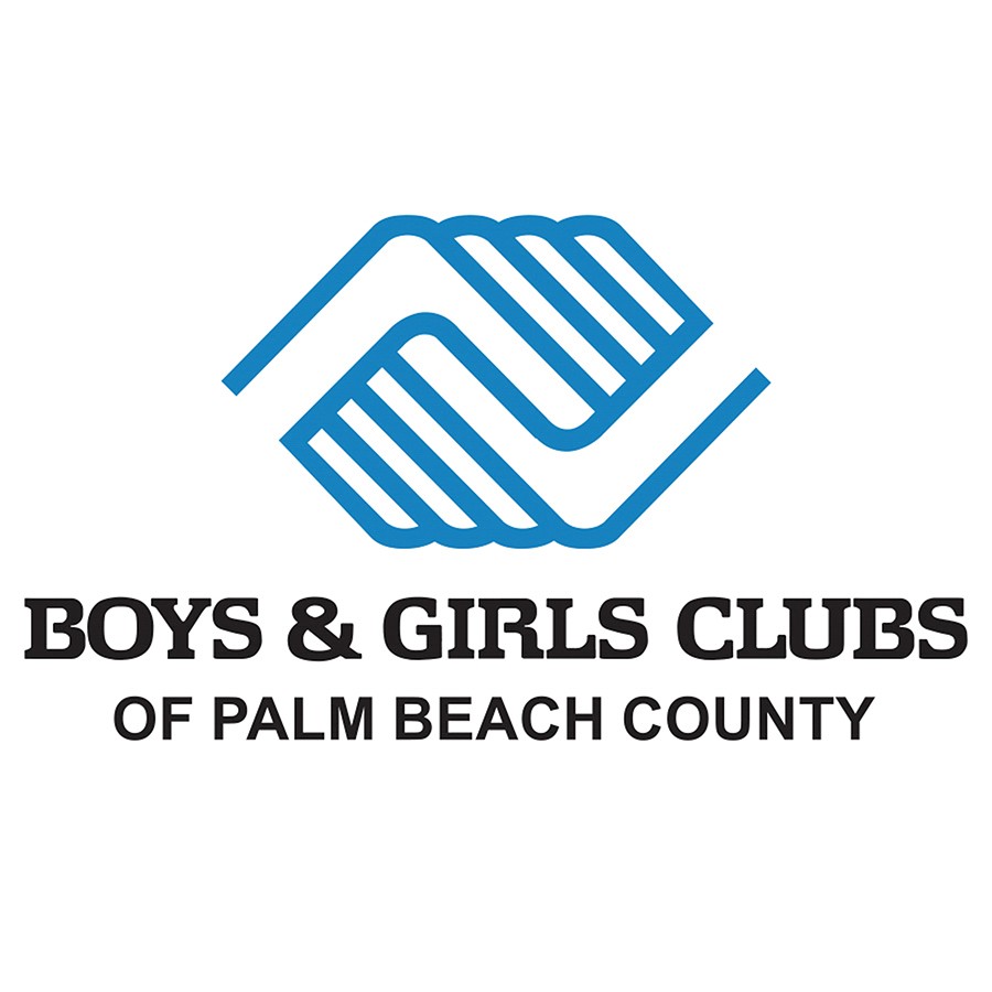 Share the Love check presentation at the Schumacher Subaru of Delray with Owner Chuck Schumacher and President & CEO of the Boys & Girls Clubs of Palm Beach County, Jaene Miranda.