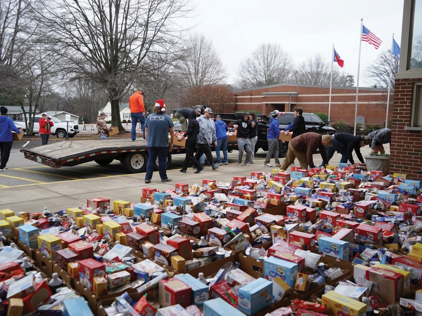 Sheriff Atkinson's Give a Kid a Christmas providing food boxes to families. Last year we provided 425 boxes to families that we serve. Impact