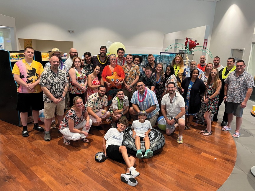 Wish Kid Santino (in tire) and his family joined the associates of Driveway Moon Township Subaru for his wish boost. Santino's wish to vacation in Clearwater, FL was magical for him and his family. Impact