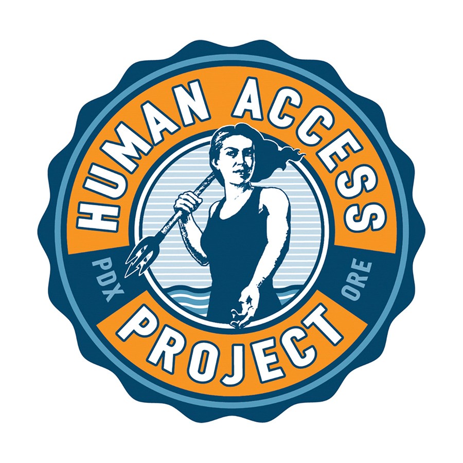 Share the Love check presentation after beach cleanup near Duckworth Swimming Dock. At the event, Subaru of Portland employees removed close to one ton of concrete off the river's edge.