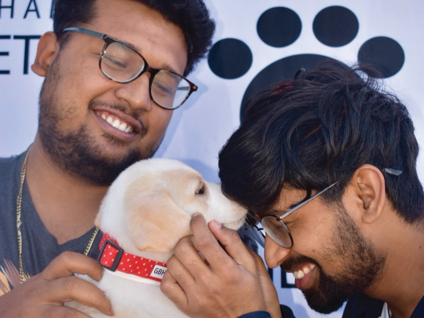 A family with their new pet from an adoption event. Hendrick Subaru's support helps us care for every animal and prepare them for the loving homes they deserve. Impact