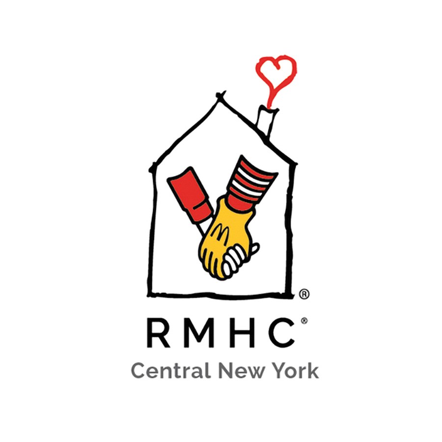 Check presentation with the funds raised for the Central New York Ronald McDonald House Charities during the 2024 Subaru Share the Love Event at Fox Subaru.