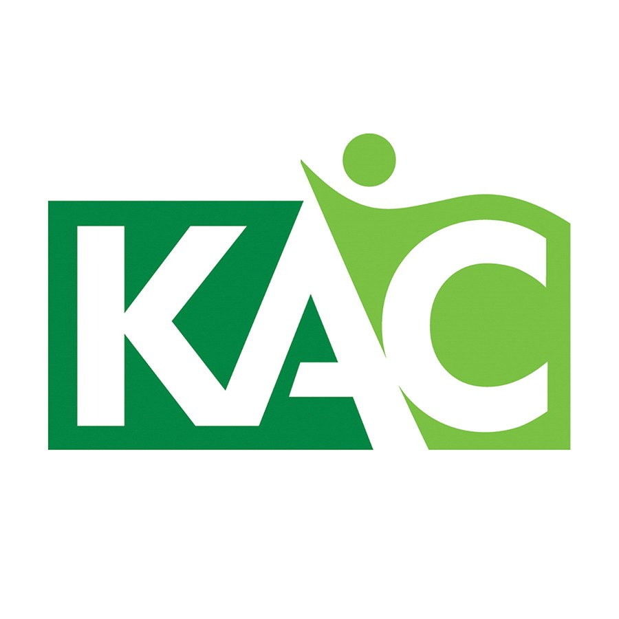 KAC staff and participants celebrate and accept the 2024 Share the Love donation at Zeigler Subaru of Kenosha.