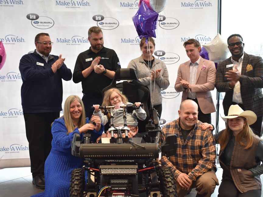 Ira Subaru Manchester hosted Madison's wish reveal. They transformed the showroom into camp setting. She walked into the room thinking she was looking at cars, but was instead welcomed by family and friends surprising her on her wish day. Impact